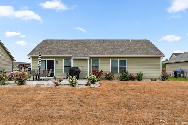 2082 Hemlock Ln, Warsaw, IN 46580 - rear view of house featuring a patio and a yard