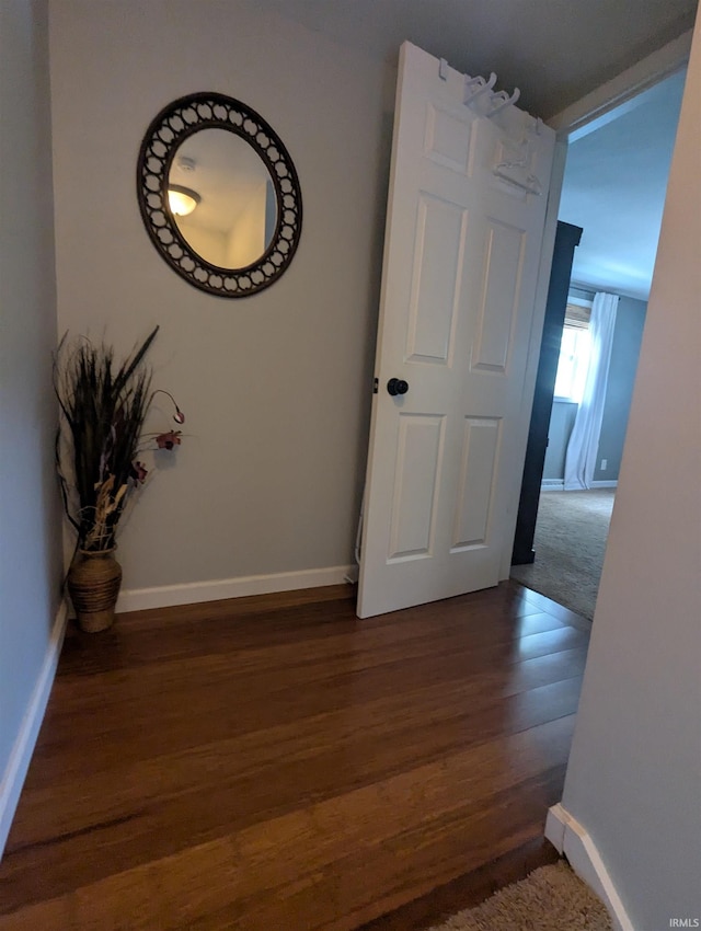 664 Columbia St, Berne, IN 46711 - hallway with wood finished floors and baseboards