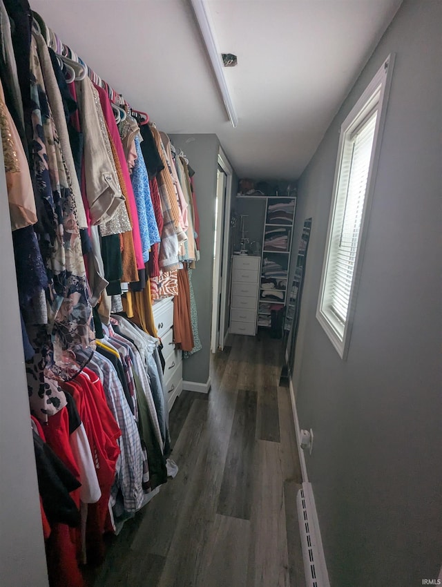 664 Columbia St, Berne, IN 46711 - spacious closet featuring a baseboard heating unit and wood finished floors
