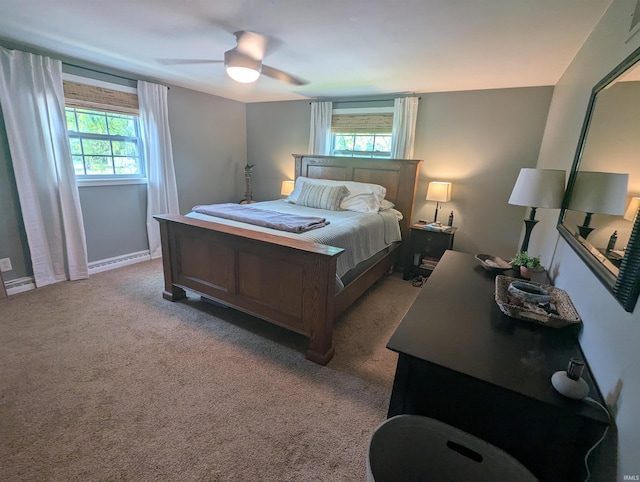 664 Columbia St, Berne, IN 46711 - bedroom with carpet floors and a ceiling fan