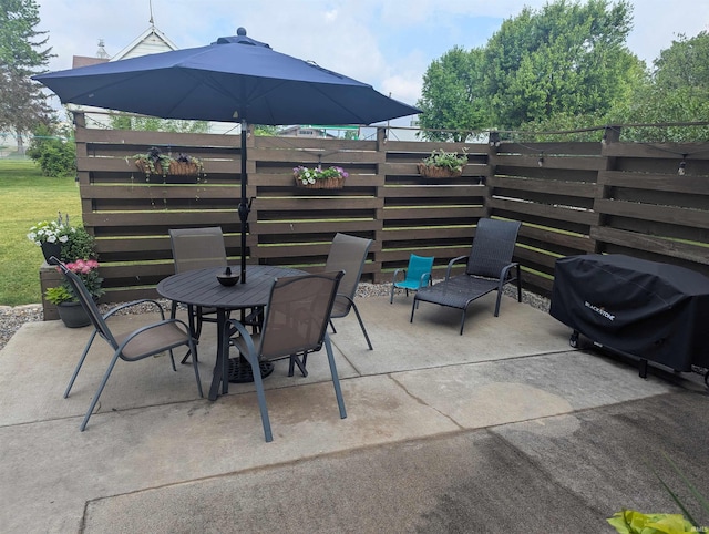 664 Columbia St, Berne, IN 46711 - view of patio featuring outdoor dining space and area for grilling