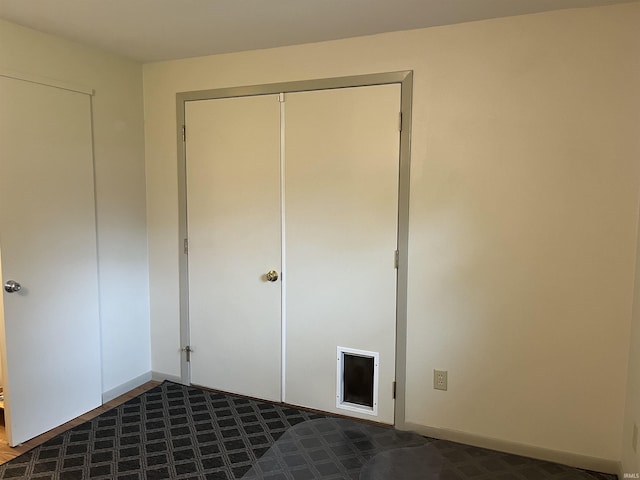 7140 Karen Ct, Fort Wayne, IN 46835 - unfurnished bedroom with a closet and baseboards