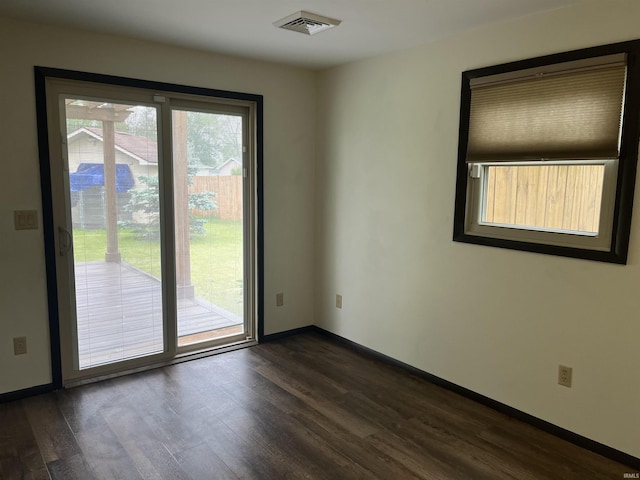 7140 Karen Ct, Fort Wayne, IN 46835 - unfurnished room featuring dark wood finished floors and baseboards