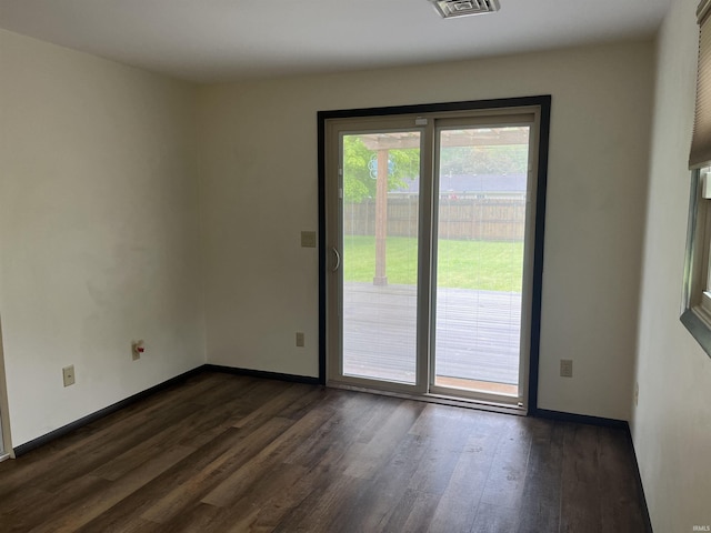 7140 Karen Ct, Fort Wayne, IN 46835 - spare room with dark wood-type flooring and baseboards