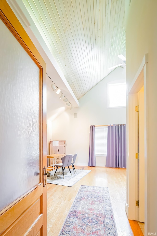 2910 W Devon Rd, Muncie, IN 47304 - hall featuring track lighting, vaulted ceiling, light wood-style floors, and wooden ceiling