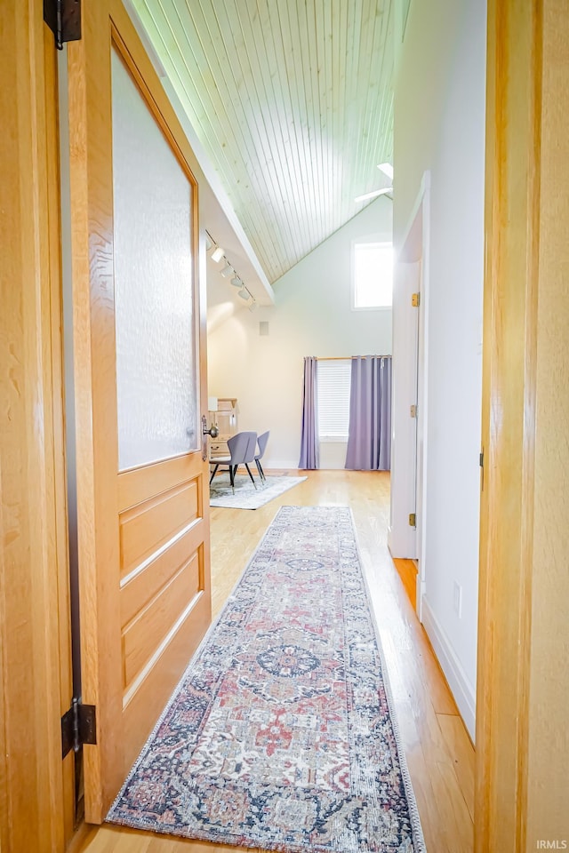2910 W Devon Rd, Muncie, IN 47304 - corridor featuring lofted ceiling, wood finished floors, wood ceiling, and baseboards
