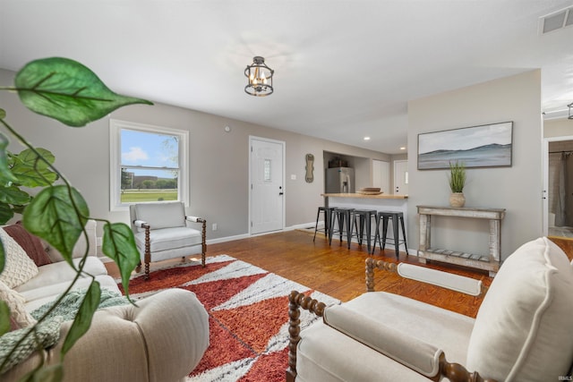 9129 Winchester Rd, Fort Wayne, IN 46819 - living room featuring wood finished floors, recessed lighting, and baseboards