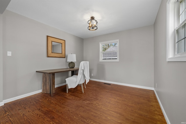 9129 Winchester Rd, Fort Wayne, IN 46819 - office with baseboards, wood finished floors, and a chandelier