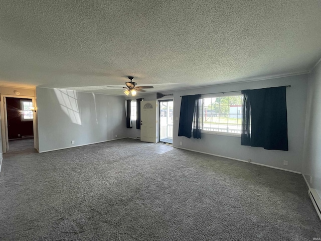 304 E 26th St, Muncie, IN 47302 - carpeted empty room featuring a textured ceiling, a ceiling fan, baseboards, and baseboard heating