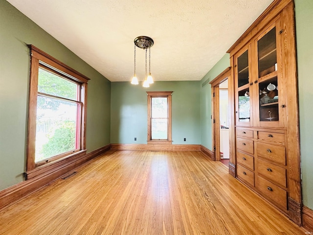 201 N Lafayette St, North Liberty, IN 46554 - unfurnished dining area with light wood finished floors and baseboards