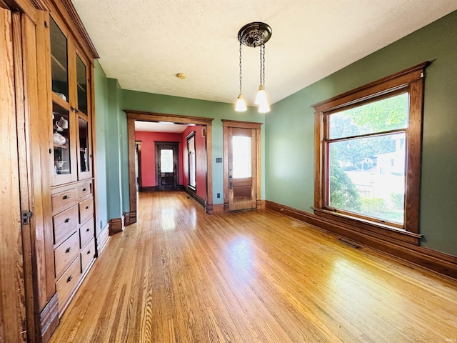 201 N Lafayette St, North Liberty, IN 46554 - unfurnished dining area featuring light wood-style flooring and baseboards