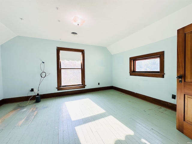 201 N Lafayette St, North Liberty, IN 46554 - bonus room featuring lofted ceiling, plenty of natural light, light wood-style flooring, and baseboards