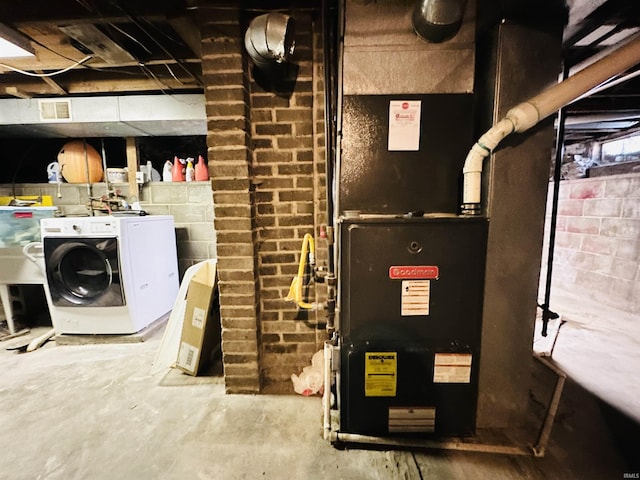 201 N Lafayette St, North Liberty, IN 46554 - utility room featuring separate washer and dryer and heating unit