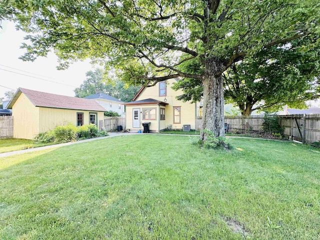 201 N Lafayette St, North Liberty, IN 46554 - view of front of home with central air condition unit and an outdoor structure