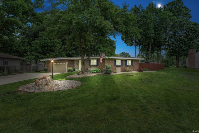 61560 Druid Ln, South Bend, IN 46614 - ranch-style home featuring driveway, an attached garage, and brick siding