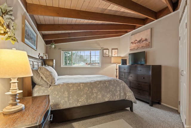 61560 Druid Ln, South Bend, IN 46614 - bedroom featuring wood ceiling with exposed beams, carpet floors, and baseboards