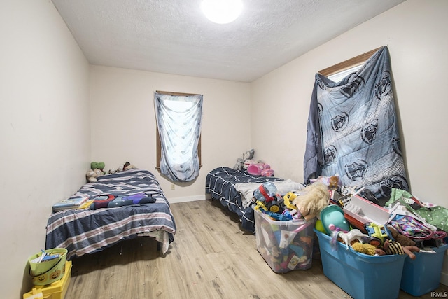 3311 Ardmore Trl, South Bend, IN 46628 - bedroom with wood finished floors and a textured ceiling