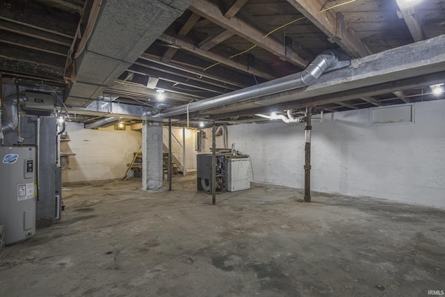 3311 Ardmore Trl, South Bend, IN 46628 - unfinished below grade area featuring electric water heater