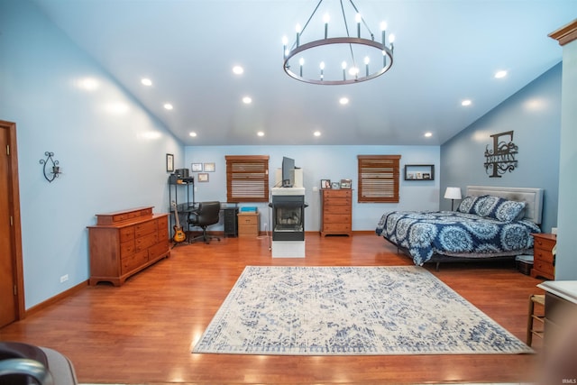 5101 Weir Dr, Muncie, IN 47304 - bedroom with lofted ceiling, a chandelier, wood finished floors, a desk, and recessed lighting