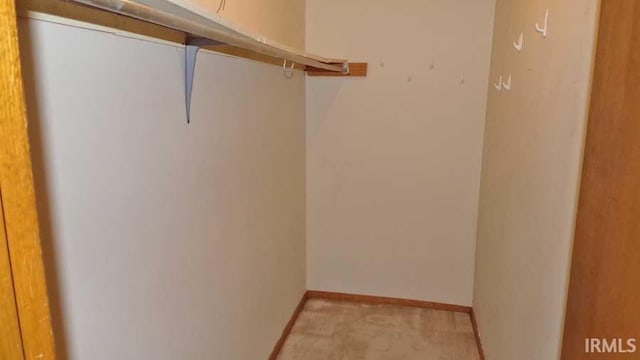 1001 Barnett St, Vincennes, IN 47591 - spacious closet featuring light colored carpet