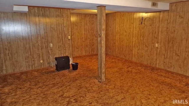1001 Barnett St, Vincennes, IN 47591 - finished basement with wooden walls and carpet flooring