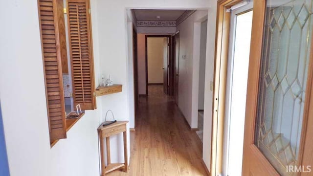 1001 Barnett St, Vincennes, IN 47591 - hallway with light wood finished floors and baseboards
