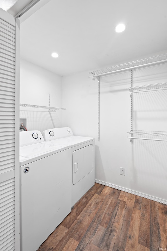 415 N Washington St, Warsaw, IN 46580 - laundry room with separate washer and dryer, dark wood-style flooring, and recessed lighting