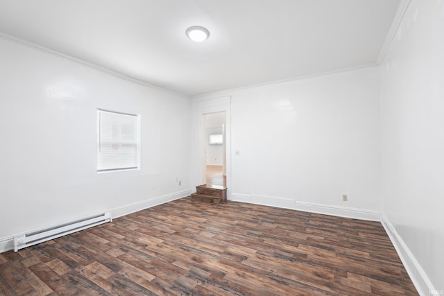 415 N Washington St, Warsaw, IN 46580 - spare room with ornamental molding, wood finished floors, baseboard heating, and baseboards