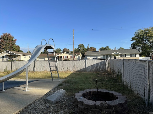 2702 Eastern Ave, Bedford, IN 47421 - view of yard with a fire pit and a residential view
