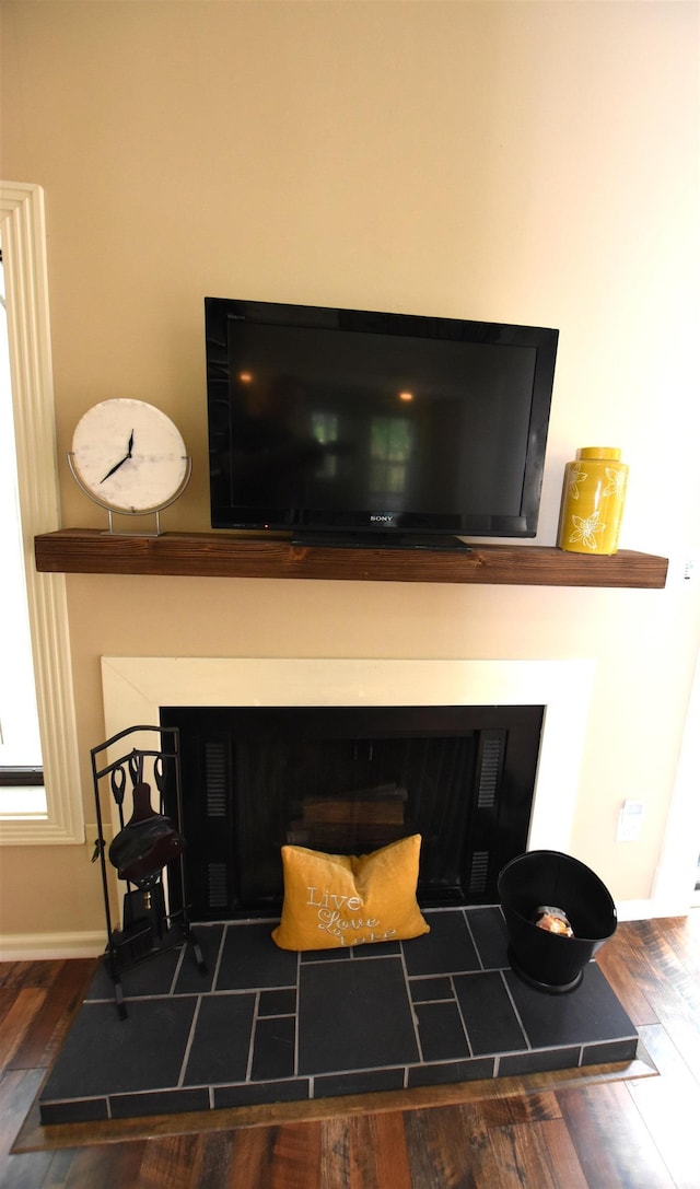9428 S Lake Ridge Dr, Bloomington, IN 47401 - detailed view of wood finished floors and baseboards