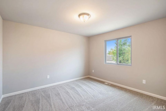 405 Somerfield Dr, Lakeville, IN 46536 - spare room with carpet flooring and baseboards