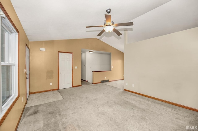 18310 Gyr Ct, New Paris, IN 46553 - empty room featuring ceiling fan, lofted ceiling, carpet flooring, and baseboards