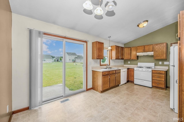 18310 Gyr Ct, New Paris, IN 46553 - kitchen featuring white appliances, a sink, under cabinet range hood, light countertops, and vaulted ceiling