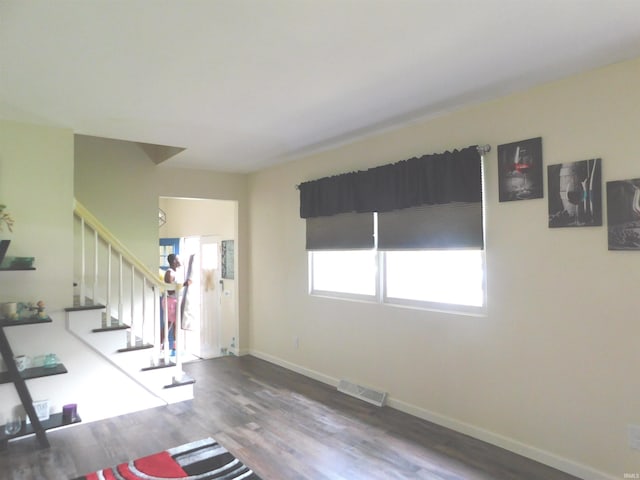53341 Crestview Dr, South Bend, IN 46635 - foyer featuring wood finished floors, stairway, and baseboards