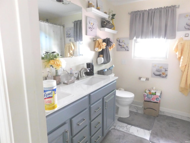 53341 Crestview Dr, South Bend, IN 46635 - bathroom featuring double vanity, toilet, and a shower with curtain