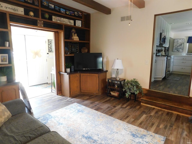 53341 Crestview Dr, South Bend, IN 46635 - living area with wood finished floors, plenty of natural light, and beamed ceiling