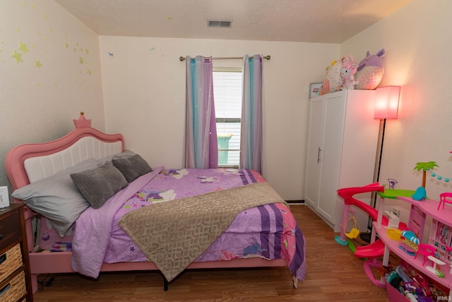1009 Berkley Cir, Mishawaka, IN 46544 - bedroom with wood finished floors