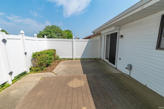 1009 Berkley Cir, Mishawaka, IN 46544 - deck featuring a fenced backyard and a patio area