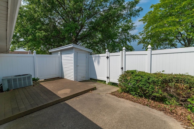 1009 Berkley Cir, Mishawaka, IN 46544 - fenced backyard featuring central AC unit and a wooden deck