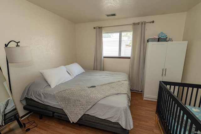 1009 Berkley Cir, Mishawaka, IN 46544 - bedroom featuring wood finished floors