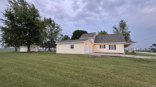 8253 S 900 W Unit 35, Lafontaine, IN 46940 - back of property with a yard and roof with shingles