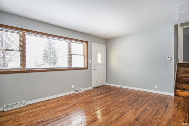 2659 Castine Walk, Mishawaka, IN 46544 - empty room featuring baseboards, wood finished floors, and stairs