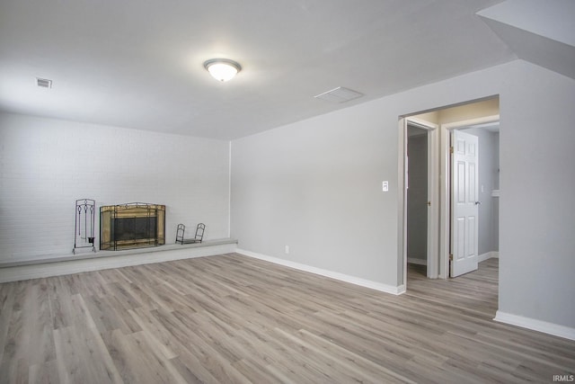 2659 Castine Walk, Mishawaka, IN 46544 - unfurnished living room featuring wood finished floors, baseboards, and a fireplace