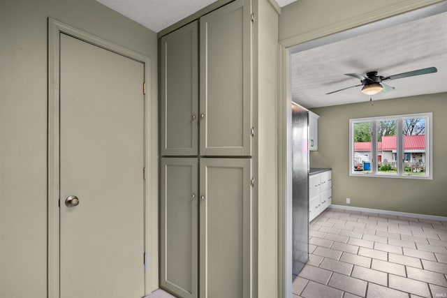 614 E S B St, Gas City, IN 46933 - kitchen with baseboards, ceiling fan, light tile patterned flooring, and freestanding refrigerator