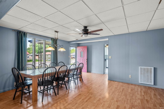 614 E S B St, Gas City, IN 46933 - dining area featuring wood finished floors, a drop ceiling, baseboards, and ceiling fan