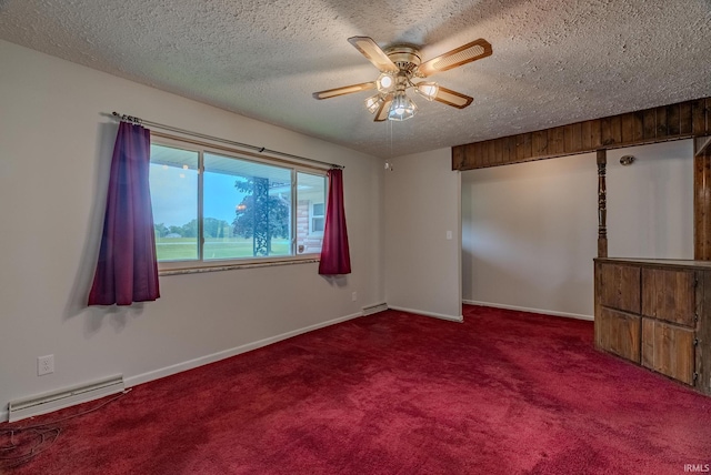 1113 E 500 S, Wabash, IN 46992 - unfurnished room featuring a baseboard radiator, a textured ceiling, ceiling fan, carpet flooring, and baseboards