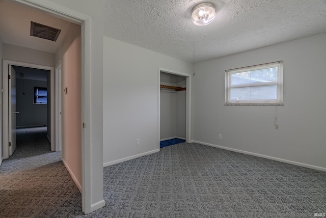 1113 E 500 S, Wabash, IN 46992 - unfurnished bedroom with carpet, a closet, baseboards, and a textured ceiling