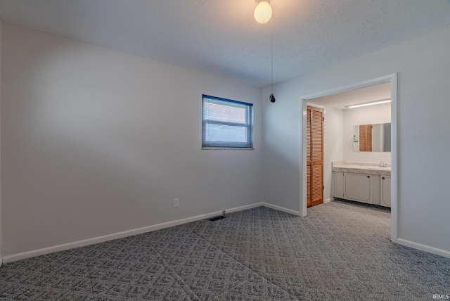 1113 E 500 S, Wabash, IN 46992 - unfurnished bedroom with baseboards, carpet, and a sink