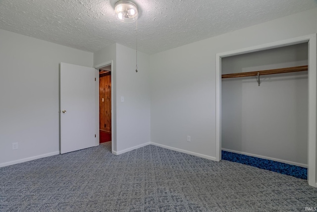 1113 E 500 S, Wabash, IN 46992 - unfurnished bedroom featuring carpet flooring, a textured ceiling, a closet, and baseboards