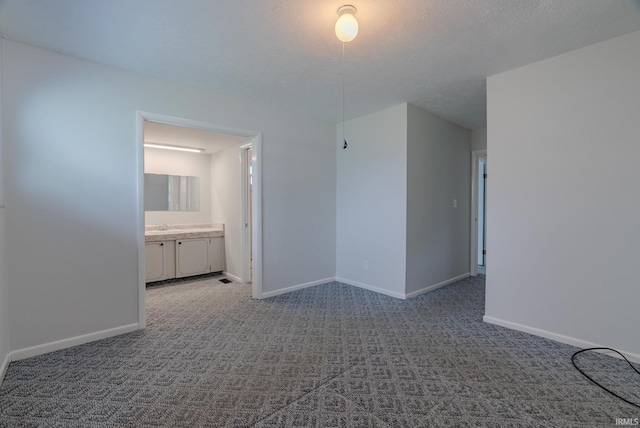 1113 E 500 S, Wabash, IN 46992 - carpeted empty room with baseboards and a sink